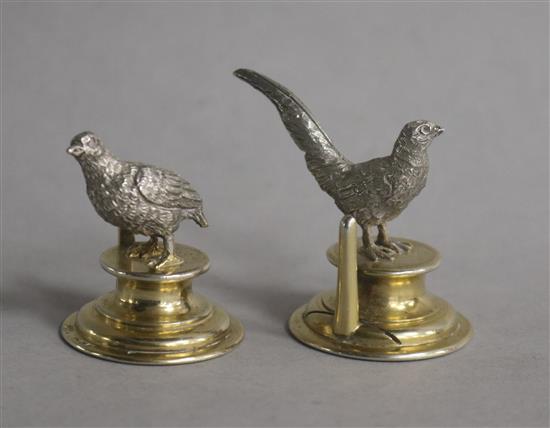 Two Edwardian parcel gilt silver menu holders modelled as a pheasant and a partridge, William Hurcombe?, London, 1907/8.